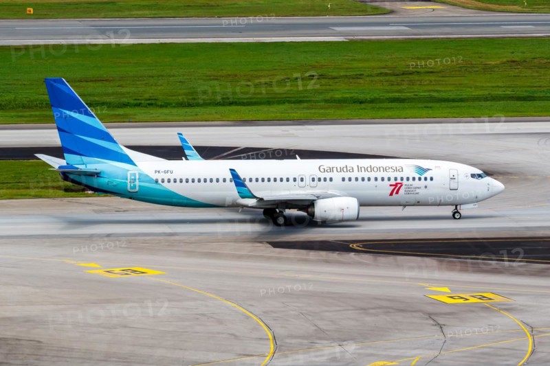 A Garuda Indonesia Boeing 737-800 aircraft with the registration PK-GFU at Changi Airport, Singapore, Asia