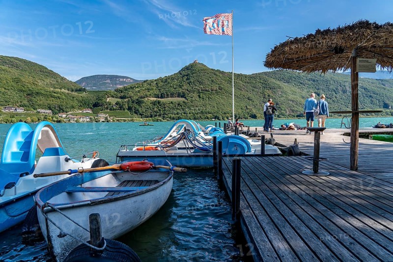 Boat hire, pedal boats, Gretl am See lido on Lake Kaltern, near the village of Kaltern, in the Adige Valley in South Tyrol, one of the two warmest lakes in the Alps, bathing lake, surrounded by vineyards and apple orchards, Italy, Europe