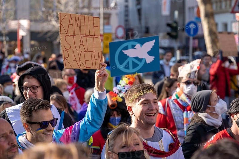Peace demonstration against the war in Ukraine, instead of the Rose Monday parade in Cologne, with over 250, 000 participants, in the city centre, with many carnivalists, North Rhine-Westphalia, Germany, Europe