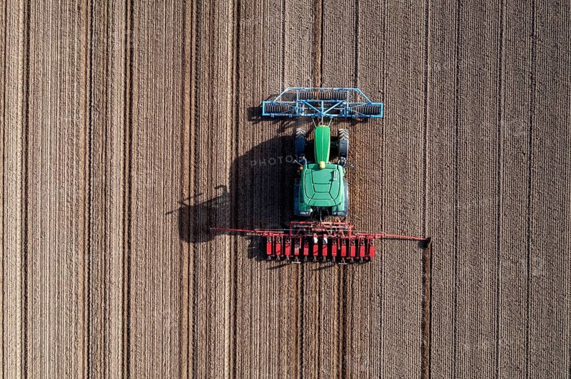 Sugar beet being sown in spring, precision sowing with precision seed drill, behind a tractor, Niederkrüchten, North Rhine-Westphalia, Germany, Europe
