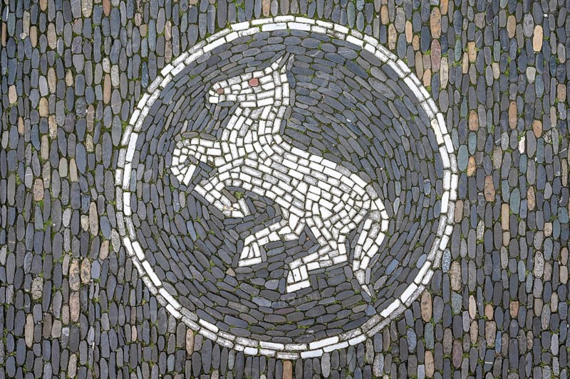 Jumping horse as a floor mosaic in Freiburg's historic city centre, Freiburg im Breisgau, Baden-Württemberg, Germany, Europe