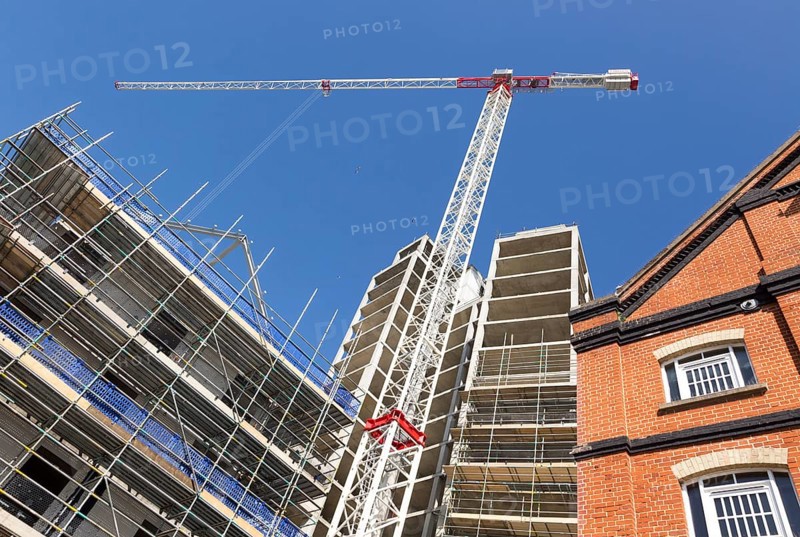 Tall crane at construction site of the 'Wine Rack' building, Waterfont, Wet Dock, Ipswich, Suffolk, England, UK