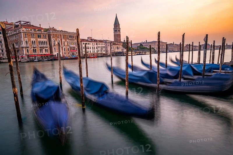 Venetian gondolas, boat dock at the customs office on the Grand Canal, Gondola Traghetto Dogana, Campanile behind, long exposure at sunrise, Venice, Veneto, Italy, Europe