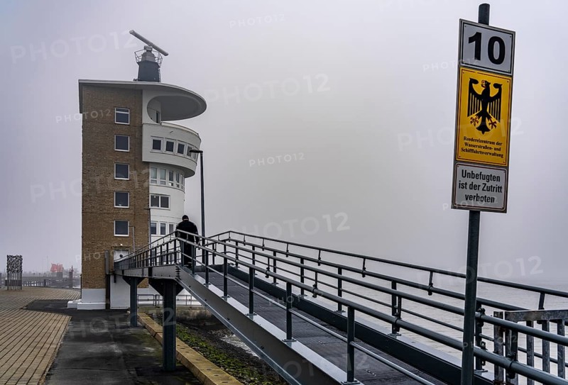 Thick fog in winter, hangs over the mouth of the Elbe into the North Sea, radar tower of the Water and Shipping Authority (WSA) Cuxhaven, viewpoint Alte Liebe in Cuxhaven, Lower Saxony, Germany, Europe