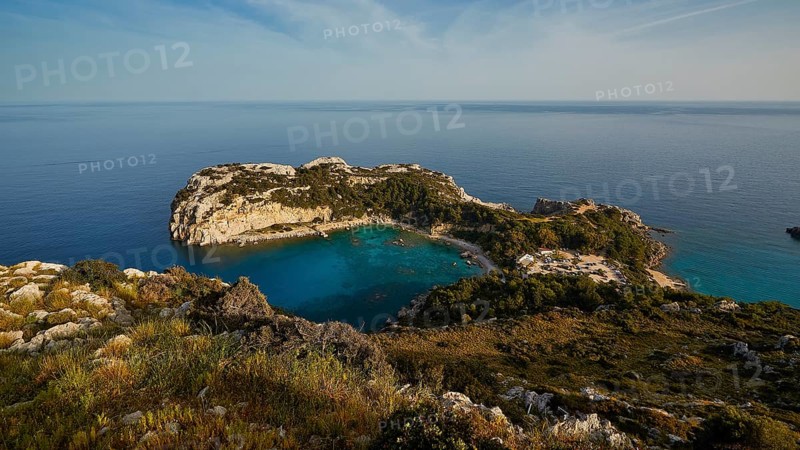 Coastal landscape with rocky cliffs and clear blue water under a sunny sky, Anthony Quinn Bay, Vagies Bay, Rhodes, Dodecanese, Greek Islands, Greece, Europe