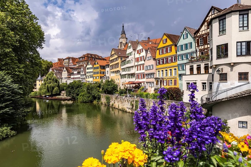 Tübingen Neckarfront with Neckar and historic facades. Postcard motif with collegiate church and Hölderlin tower. Tübingen, Baden-Württemberg, Germany, Europe