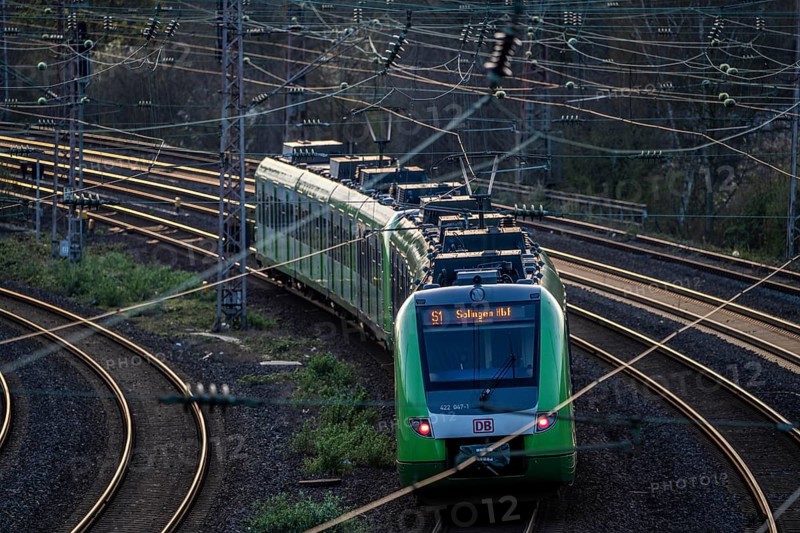 S-Bahn train on the tracks, railway layout, railway line west of the main station of Essen, North Rhine-Westphalia, Germany, Europe