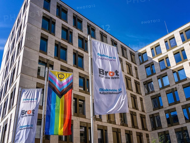Flags in front of the office of Bread for the World, Berlin-Mitte, Germany, Europe