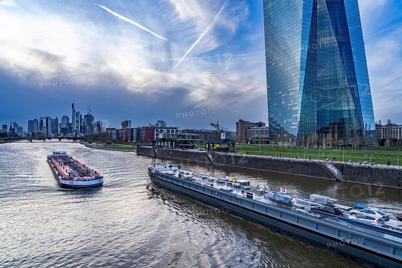 Skyline of Frankfurt am Main, skyscrapers, business and banking district in the city centre, cargo ships, tankers, on the river Main, ECB building, Hesse, Germany, Europe