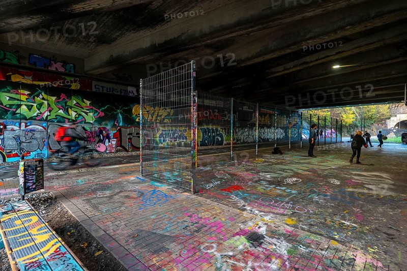 The Nordbahntrasse, a cycle path, footpath, on a former 22 km long railway line, along the west-east axis of Wuppertal, on the northern slope, with many tunnels, viaducts and views of the city, graffiti and basketball area at Brill, Wuppertal, North Rhine-Westphalia, Germany, Europe