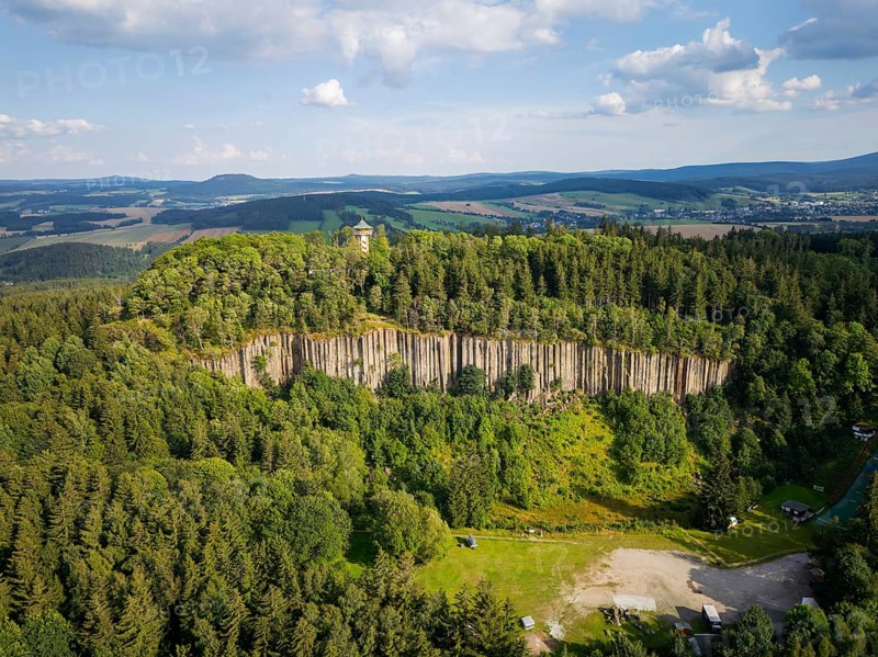 The Scheibenberg is a mountain in the Ore Mountains in Saxony with an altitude of 807.2 metres above sea level. It is located directly south-east of the town of Scheibenberg in the Erzgebirge district of the same name. Together with the BÃ¤renstein and the Pöhlberg, the mountain is one of the three large basalt mountains in the Westerzgebirge. Due to its significance as one of the most important geological monuments in Germany, the Scheibenberg geotope is an associated site of the Erzgebirge/KrusnohoÅ™Ã­ mining region, which has been a UNESCO World Heritage Site since 2019., Scheibenberg, Scheibenberg, Saxony, Germany, Europe