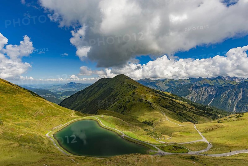 Riezler Alpsee, an artificial lake, snow pond, feeds the snow cannons that completely cover the slopes of the Fellhorn and Kanzelwand cable cars with snow, behind it the Fellhorn, 2038m, AllgÃ¤u Alps, Bavaria, Germany, Europe