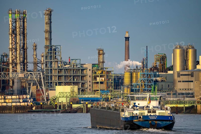 Backdrop of Chempark Leverkusen, Bayer Leverkusen, chemical park, chemical plant, river Rhine, cargo ship, Leverkusen, North Rhine-Westphalia, Germany, Europe
