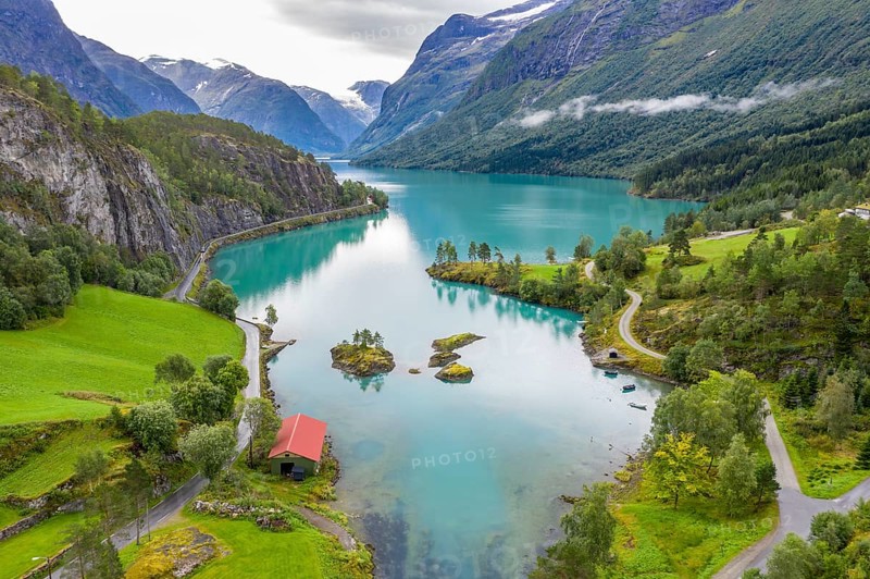 Aerial view of lake Lovatnet (or: Loenvatnet), view towards south to glacier Jostedalsbreen, islands in the lake, valley Lodalen south of village Loen, Norway, Europe