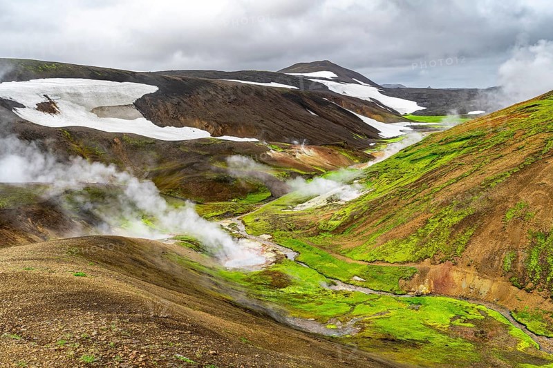 Colourful volcanic landscape with hills and snow, volcanic steaming hot springs, Laugavegur trekking trail, Landmannalaugar, Fjallabak Nature Reserve, Icelandic Highlands, Sudurland, Iceland, Europe