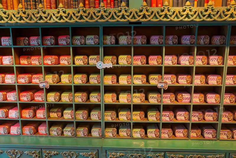 A shelf in the shop stocked with many tins of sardines in different colours and designs, giving a retro-inspired feel, tinned sardines, Ã“bidos, Obidos, Oeste, Centro, Estremadura, Portugal, Europe