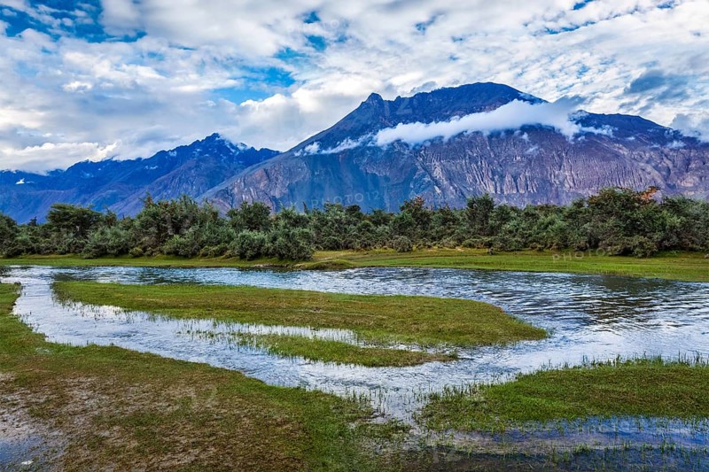 Panorama of Himalayas and landscape of Nubra valley on sunset. Hunber, Nubra valley, Ladakh, India, Asia