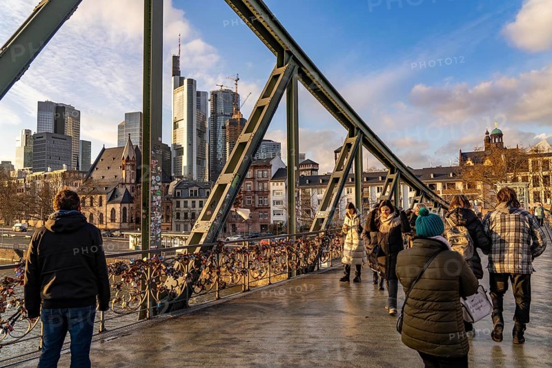 Skyline of the city centre of Frankfurt am Main, river Main, Eiserner Steg bridge, dusk, Hesse, Germany, Europe
