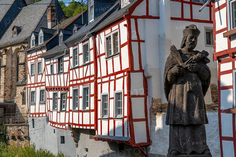 Monreal, idyllic half-timbered village in the Elz valley, figure of Nepomuk, the bridge saint, in the district of Mayen-Koblenz in Rhineland-Palatinate, Germany, Europe