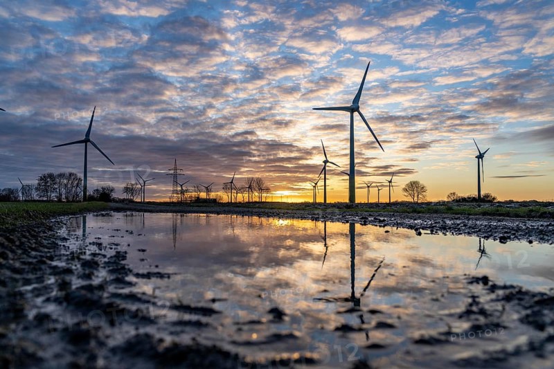 Wind farm near the East Frisian town of Norden, east of the town, sunset, Lower Saxony, Germany, Europe
