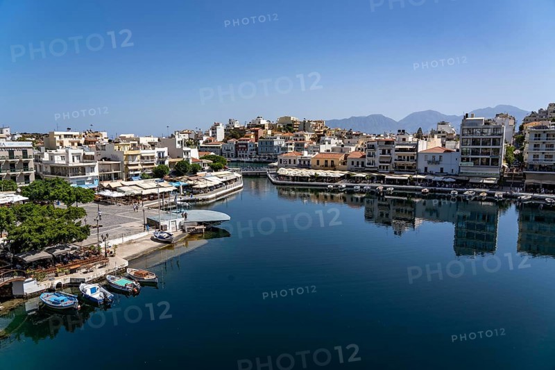The village of Agios Nikolaos, in the eastern part of Crete, view over Lake Voulismeni, connected to the sea, old town, Greece, Europe