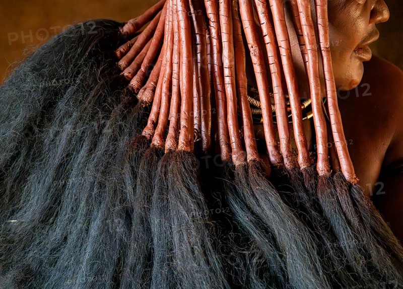 Hair in traditional hairstyle of a Himba woman, detail near Opuwo, Kaokoveld, Kunene, Namibia, Africa