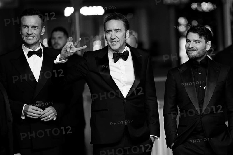 Cannes, France, 17.5.2024: Julian McMahon, Nicolas Cage and Justin Rosniak at the premiere of The Surfer on the red carpet of the Palais des Festivals during the 77th Cannes International Film Festival. The 77th Cannes International Film Festival will take place from 14 to 25 May 2024. Note: the photo was subsequently converted to b/w, Europe