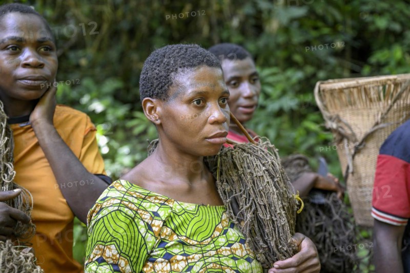 Pygmy woman of the Baka or BaAka people with their hunting nets, Dzanga-Sangha Special Dense Forest Reserve, Sangha-Mbaéré Prefecture, Central African Republic, Africa