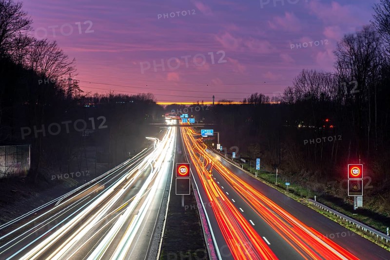 Motorway A40, Ruhrschnellweg, near Bochum, dense evening traffic, in front of the motorway junction Bochum, A43, view in west direction, North Rhine-Westphalia, Germany, Europe