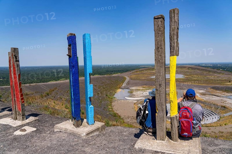 The Haniel spoil tip, 185 metre high spoil tip, at the Prosper Haniel mine, which was closed in 2019, artwork Totems by the sculptor Augustin Ibarrola, mountain arena, amphitheatre, Bottrop, Germany, Europe