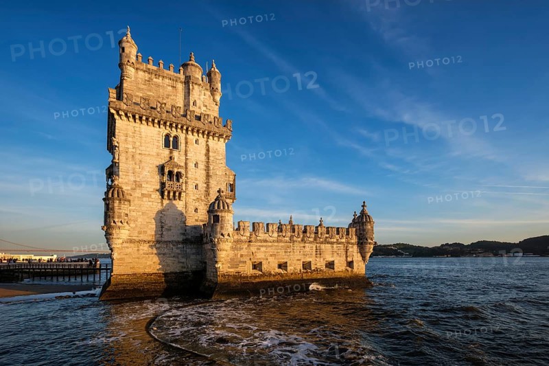 Belem Tower or Tower of St Vincent, famous tourist landmark of Lisboa and tourism attraction, on the bank of the Tagus River Tejo on sunset. Lisbon, Portugal, Europe