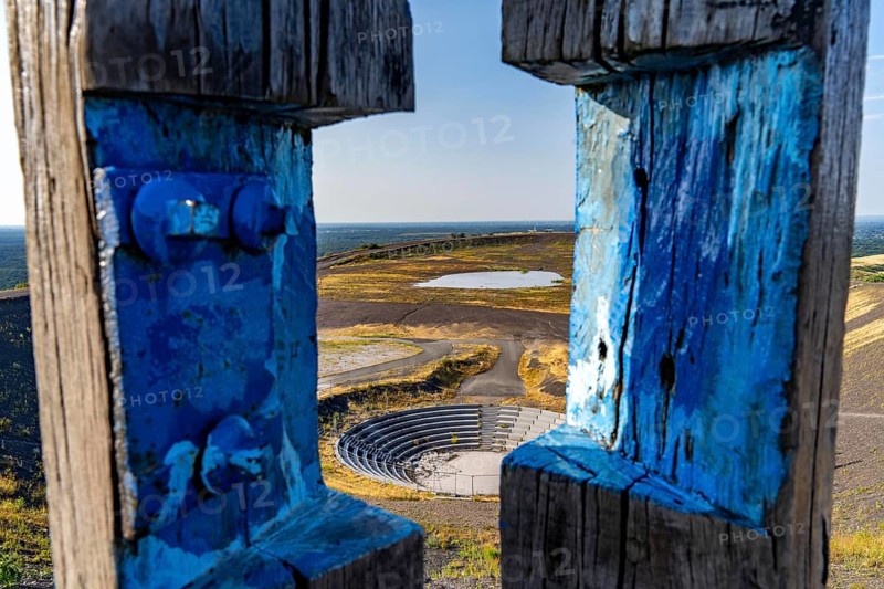 The Haniel spoil tip, 185 metre high spoil tip, at the Prosper Haniel mine, which was closed in 2019, artwork Totems by the sculptor Augustin Ibarrola, mountain arena, amphitheatre, Bottrop, Germany, Europe