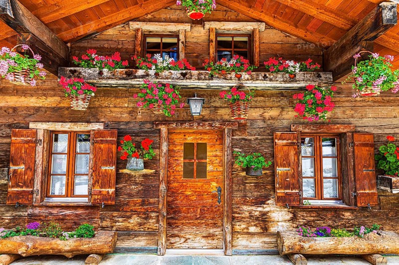Old wooden house with floral decorations, historic village centre, Grimentz, Val d'Anniviers, Valais Alps, Canton Valais, Switzerland, Europe