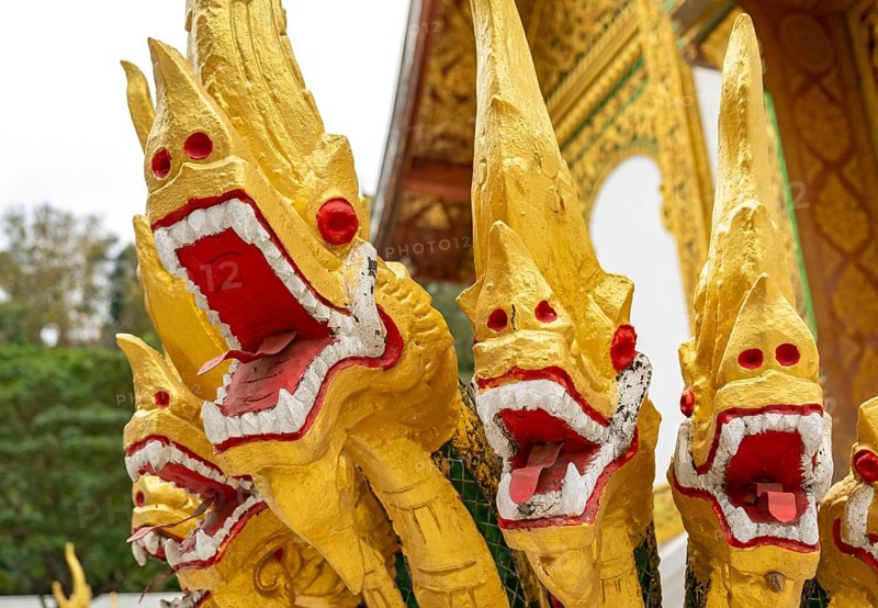 Naga at the steps of Wat Ho Pha Bang temple, Royal Palace, Luang Prabang, Laos, Asia