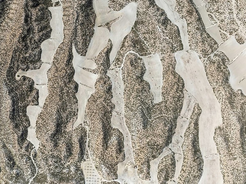 Farmland amongst rocky outcrops. Aerial view. Drone shot. Granada province, Andalusia, Spain, Europe