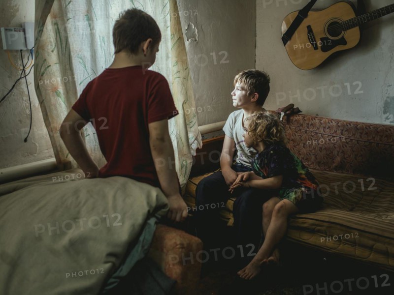 Sasha, 9 years old, Dima, 12 years old and Nastya, 5 years old. They live in the village of Borshchivka, which was occupied by the Russian army for over six months. They suffer from anxiety disorders, the front is only a few kilometres away as the crow flies, Borshchivka, Raion Isyum, Kharkiv Oblast, Ukraine, Europe