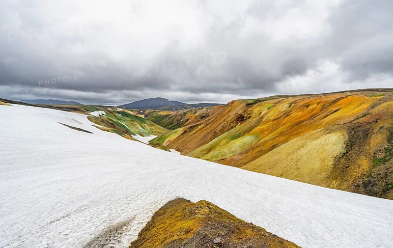 Colourful volcanic landscape with hills and snow, Laugavegur trekking trail, Landmannalaugar, Fjallabak Nature Reserve, Icelandic Highlands, Sudurland, Iceland, Europe