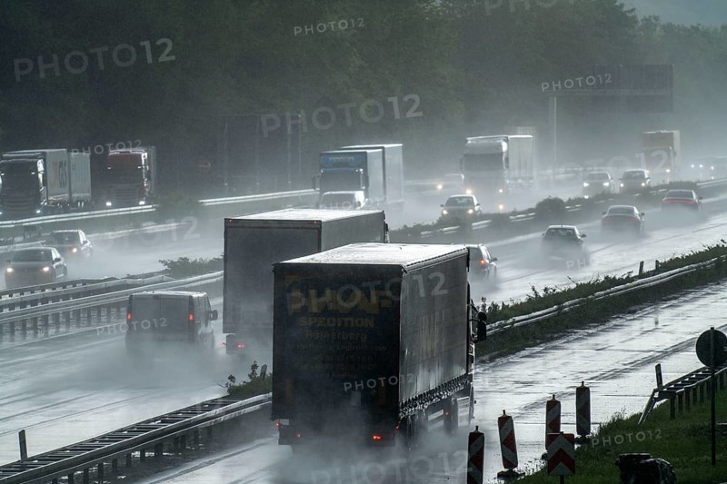 A2 motorway, at Recklinghausen motorway junction, heavy traffic during a thunderstorm, North Rhine-Westphalia, Germany, Europe