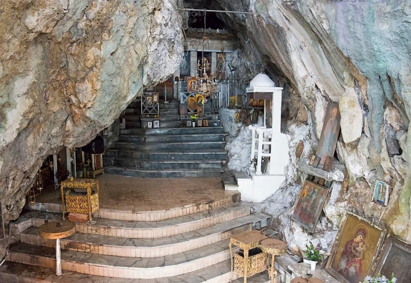 Interior view of a chapel built into the cave with steps and candles, rock church of Smerna, Church of the Assumption of the Virgin Mary, Panagia Smerniotissa, Elis, Peloponnese, Greece, Europe