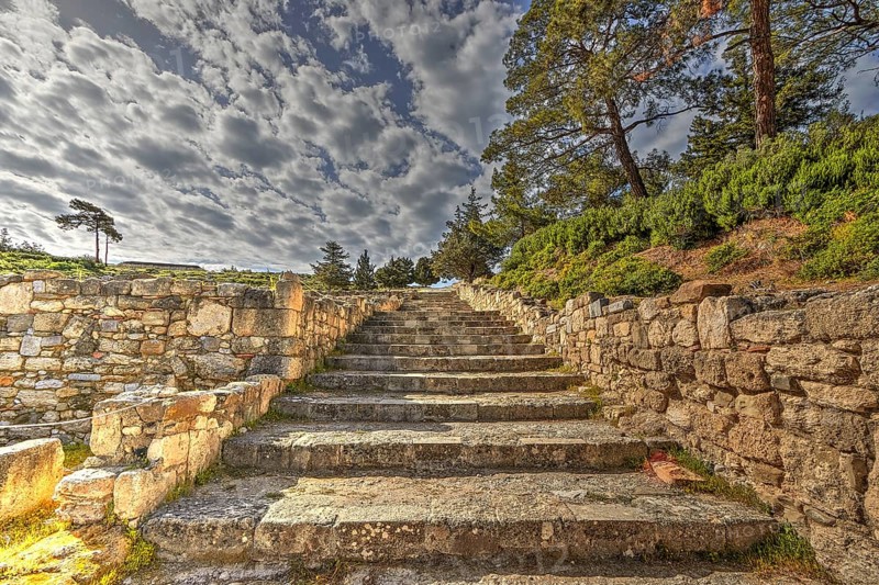 HDR, Super wide angle shot, Ancient stone staircase with surrounding ruins and tree vegetation under cloudy sky, Kamiros, Archaeological site, Ancient city, Foundation of Doric Greeks, Rhodes, Dodecanese, Greek Islands, Greece, Europe