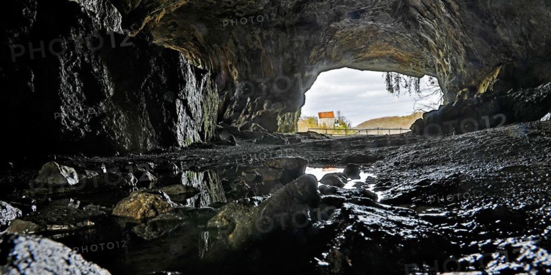 View from the Feldhof Cave in the Hönne Valley in Balve to Klusenstein Castle in Hemer, MÃ¤rkisches Sauerland, North Rhine-Westphalia, Germany, Europe