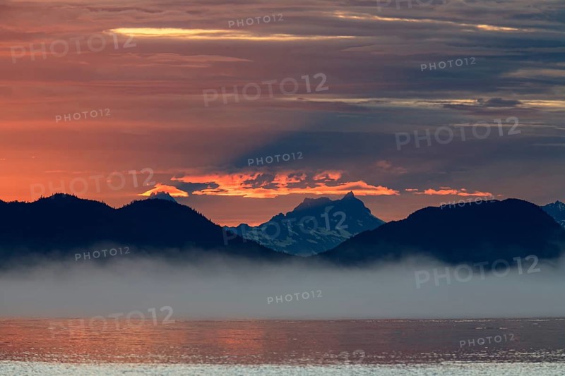 Clouds and sunset over the sea, mountain landscape, fog, Juneau, Southeast Alaska, Alaska, USA, North America