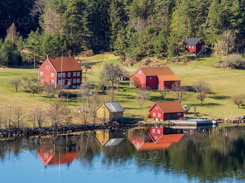 Farm with red houses on an island near Risor, norwegean southern coast, Norway, Europe