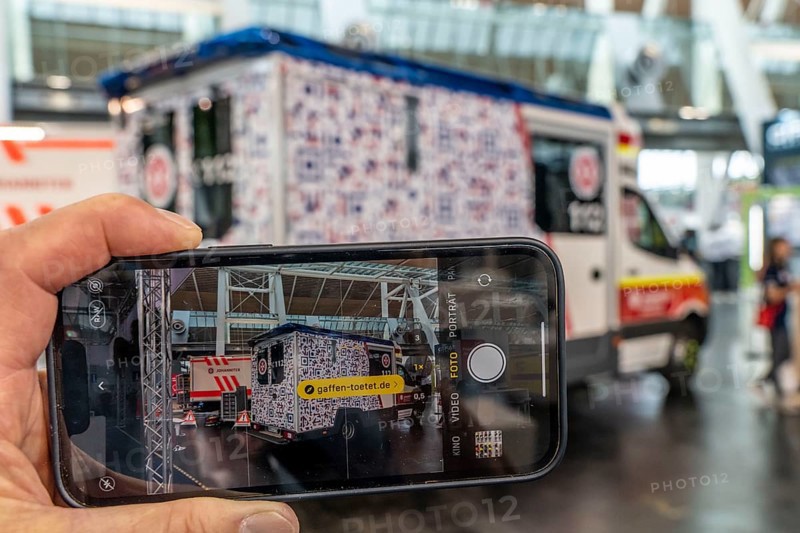 Gawking kills, the Johanniter Unfallhilfe project, an ambulance is covered with a QR code, when gawkers take photos with their mobile phones at an emergency scene, they are redirected to the project's website, Interschutz 2022 trade fair in Hanover, the world's largest trade fair for fire, rescue and disaster control technology, equipment, over 1300 exhibitors from 50 countries, disaster control