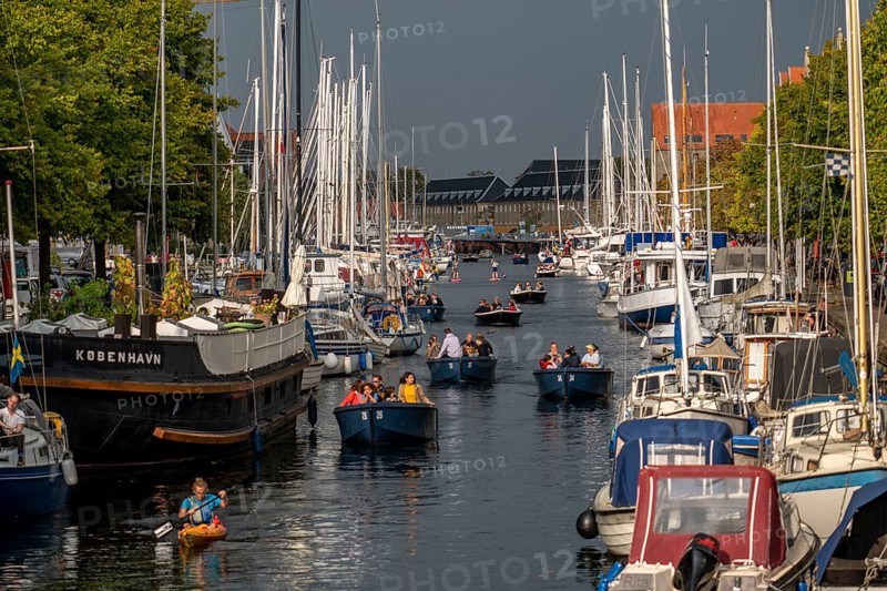 Christianshavns Kanal, round trip with electric hire boat, old district, at the same time very lively and hip neighbourhood, criss-crossed by many canals, with shops, pubs, living space, Copenhagen, Denmark, Europe
