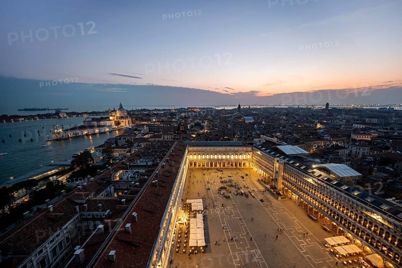 Evening atmosphere, illuminated Basilica di Santa Maria della Salute and St Mark's Square, view from the Campanile di San Marco bell tower, city view of Venice, Veneto, Italy, Europe