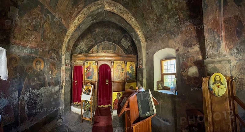 Interior of historic small single-nave church Panagia Throniotissa Naos Panagia of Dormition of the Virgin Mary of the Assumption in Thronos built in 14th century on part of area of destroyed predecessor church Episcopal Basilica of Sybrita, Thronos, Crete, Greece, Europe