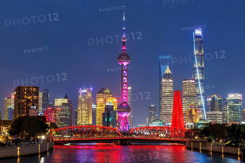Shanghai skyline at the Bund with Oriental Pearl Tower city centre downtown at night in Shanghai, China, Asia