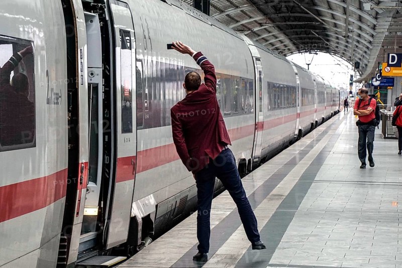 ICE train conductor shows signal for departure, Berlin, 21/09/2021