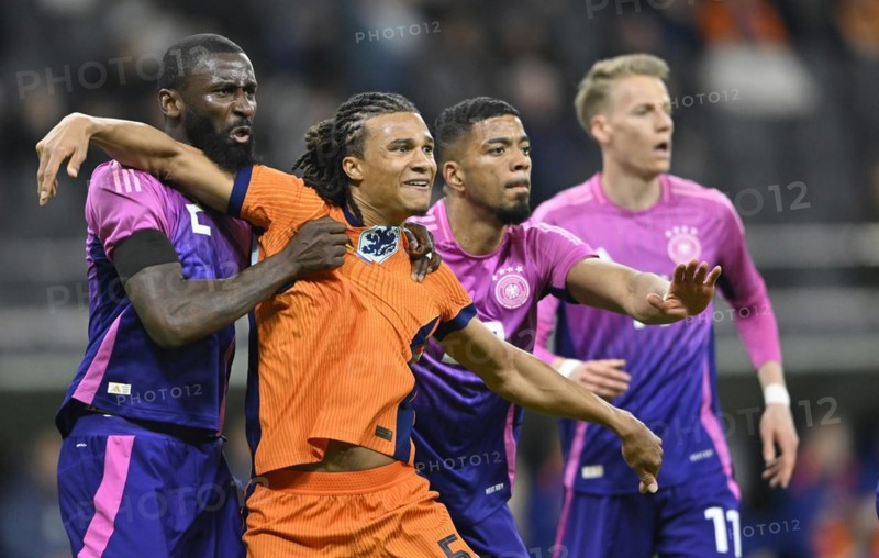 duel, action, Benjamin Henrichs GER Chris Führich GER Antonio Rüdiger GER vs Nathan Aké NED international match Germany GER vs Netherlands NED, Deutsche Bank Park, stadium, Frankfurt am Main, Hesse, Germany, Europe